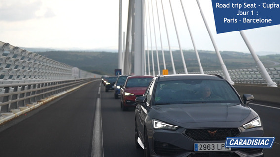 Les huit autos sur le viaduc de Millau, le pont le plus haut du monde (343 mètres).